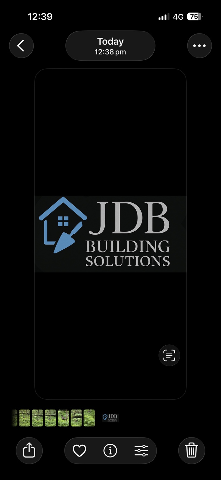 JDB Building Solutions — blue house and trowel with silver lettering